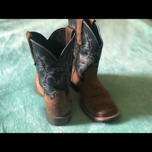 Little boys Ariat cowboy boots.